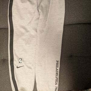 Nike authentic 76ers snap away warm up pants